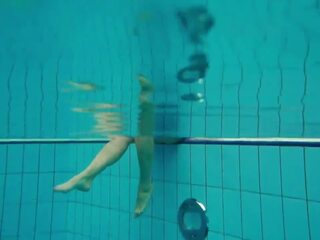 Tempting brunette Deniska underwater