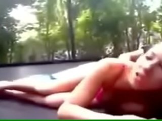Desirable young young lady Fucks on a Trampoline
