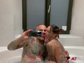 Busty inked chick stuffed by a big shaft in the bath